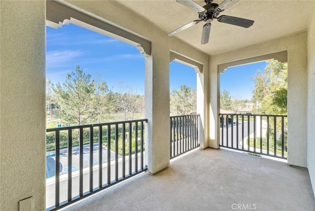 balcony with a ceiling fan