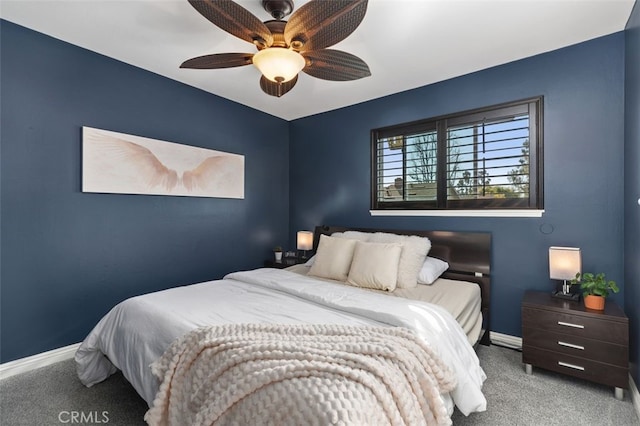 bedroom with baseboards, a ceiling fan, and light colored carpet