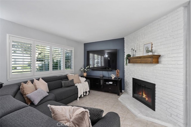 living room featuring light tile patterned floors and a fireplace