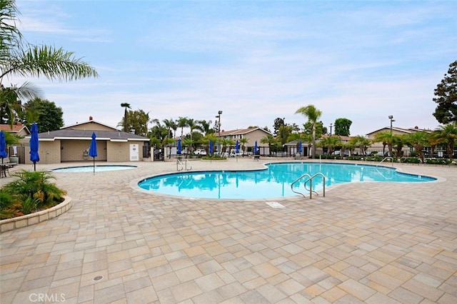 pool with a patio area