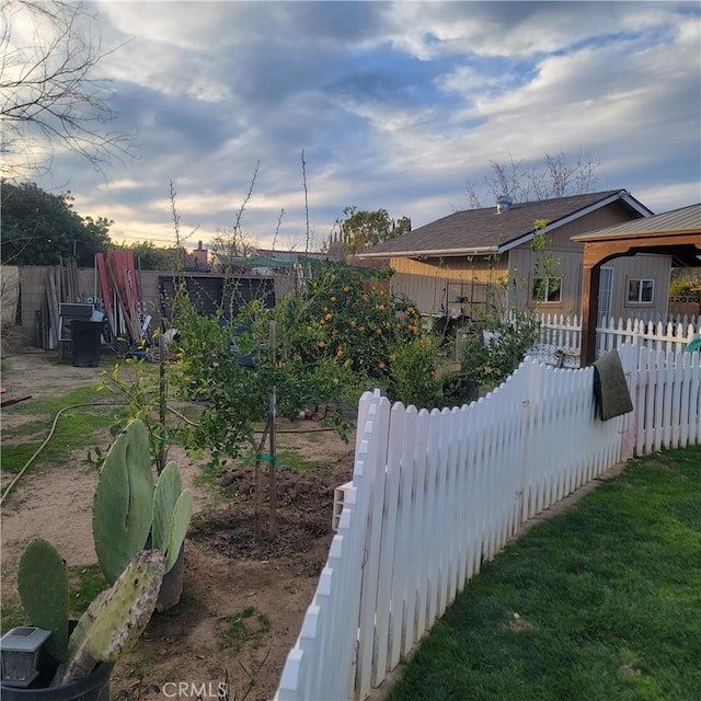 yard at dusk with fence