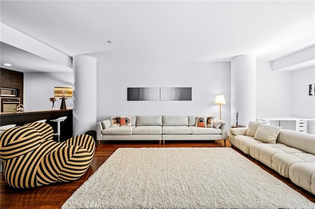 living room featuring dark wood finished floors