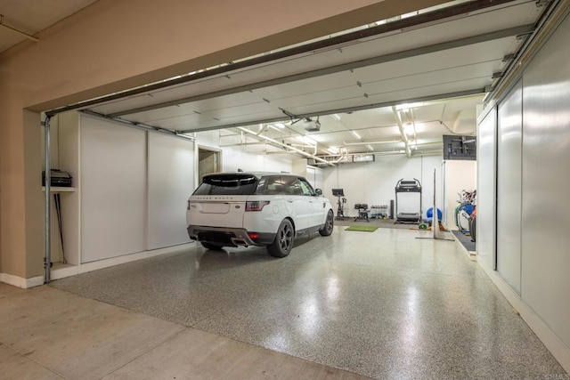 garage featuring a garage door opener