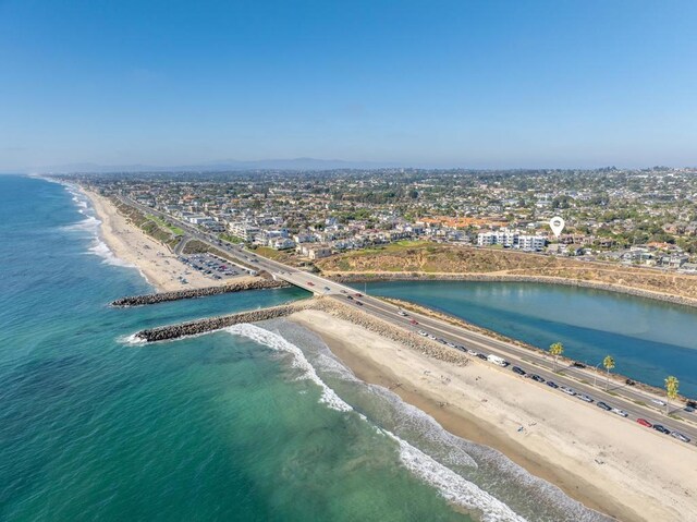 aerial view with a view of city, a water view, and a view of the beach