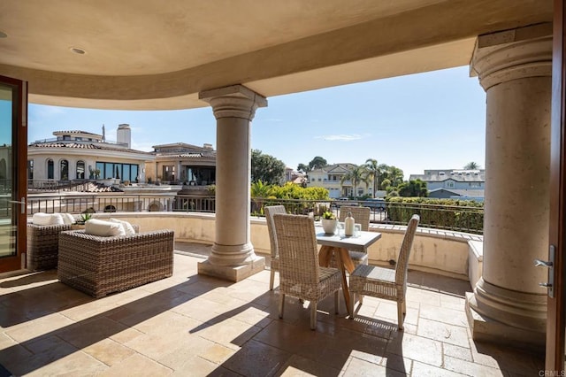 view of patio featuring a residential view and outdoor dining area