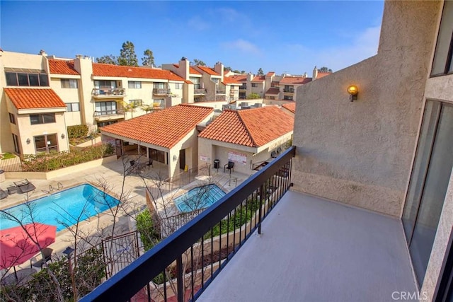 balcony featuring a residential view