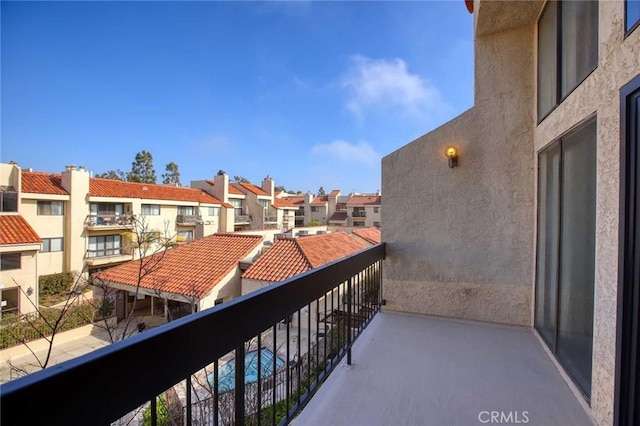 balcony featuring a residential view