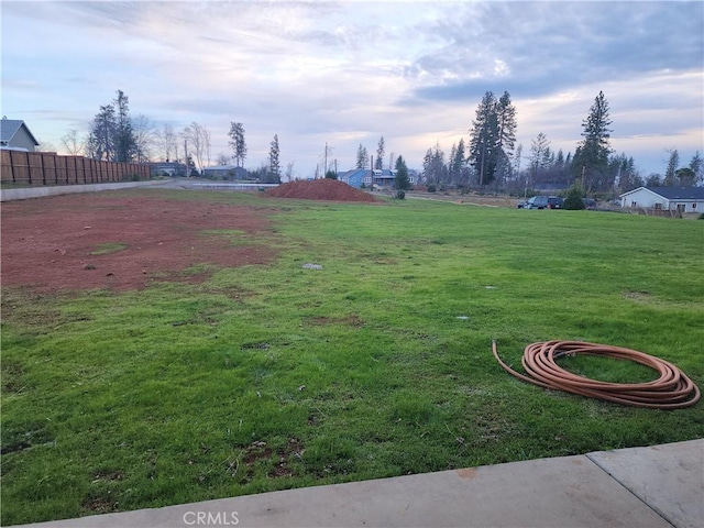 view of yard with fence