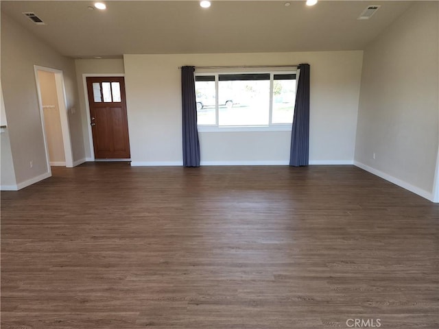 interior space featuring baseboards, visible vents, recessed lighting, and a wealth of natural light