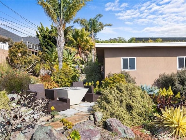 exterior space with stucco siding