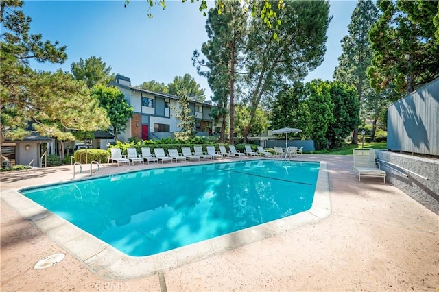 community pool featuring a patio