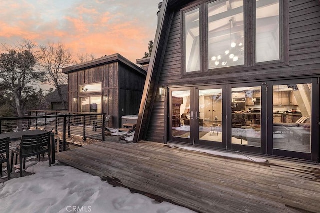 wooden deck featuring french doors