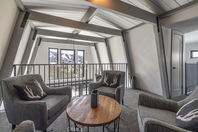 interior space featuring lofted ceiling with beams and carpet floors