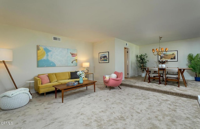 living area featuring a chandelier, carpet flooring, and visible vents