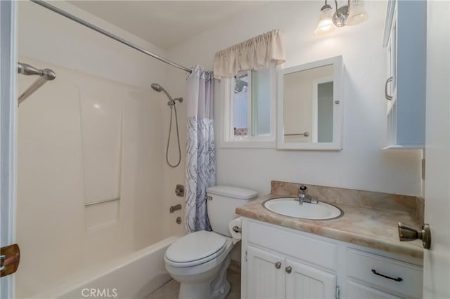 bathroom featuring toilet, vanity, and shower / tub combo with curtain