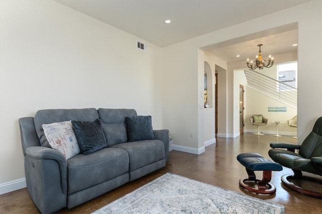 living area with a chandelier, recessed lighting, visible vents, and baseboards