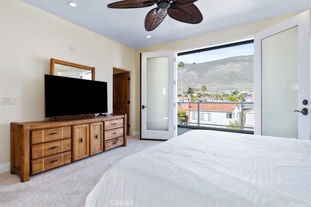 bedroom with access to exterior, recessed lighting, light carpet, ceiling fan, and baseboards