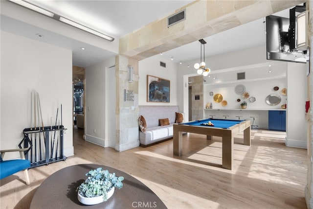 rec room with pool table, visible vents, and light wood finished floors