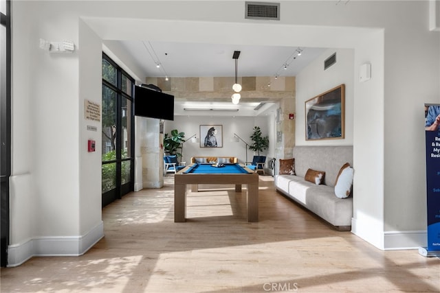 rec room with rail lighting, visible vents, wood finished floors, billiards, and baseboards