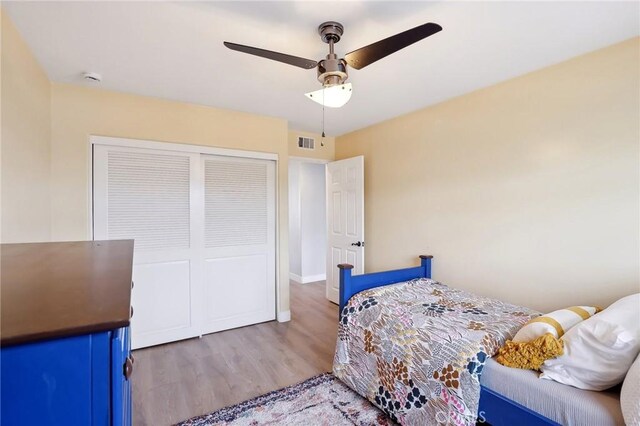 5726 Sunmist Dr, Rancho Palos Verdes, CA 90275 - bedroom with wood finished floors, a closet, and ceiling fan