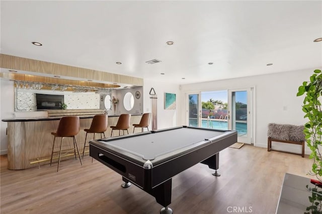 rec room with visible vents, bar, pool table, light wood-type flooring, and recessed lighting