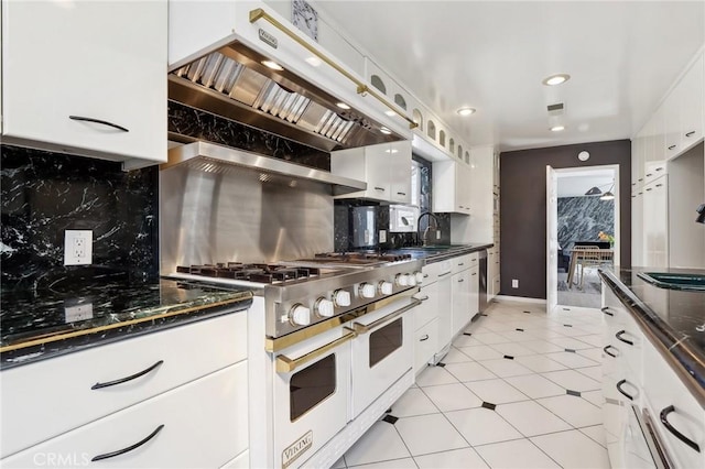 5726 Sunmist Dr, Rancho Palos Verdes, CA 90275 - kitchen with double oven range, extractor fan, a sink, decorative backsplash, and white cabinetry