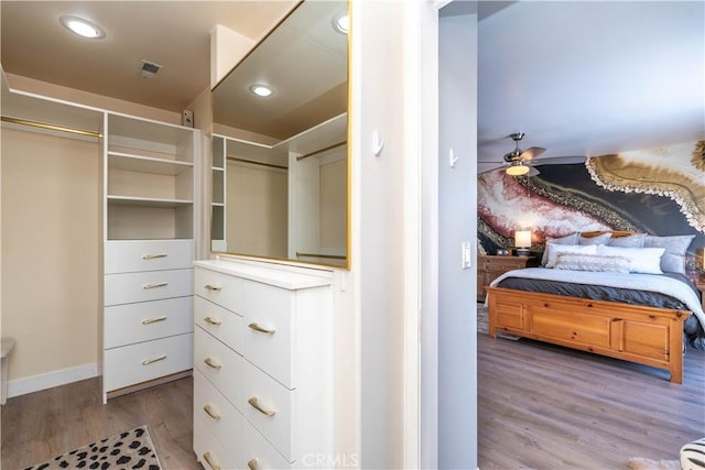 5726 Sunmist Dr, Rancho Palos Verdes, CA 90275 - spacious closet with wood finished floors and ceiling fan