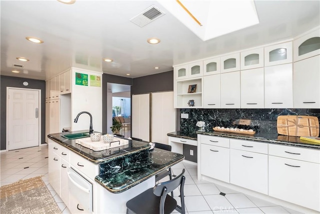 5726 Sunmist Dr, Rancho Palos Verdes, CA 90275 - kitchen featuring a sink, a warming drawer, light tile patterned floors, backsplash, and recessed lighting