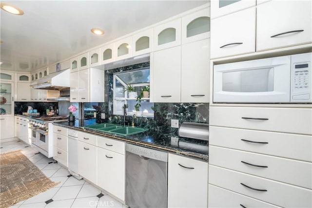 5726 Sunmist Dr, Rancho Palos Verdes, CA 90275 - kitchen with appliances with stainless steel finishes, exhaust hood, tasteful backsplash, white cabinets, and a sink