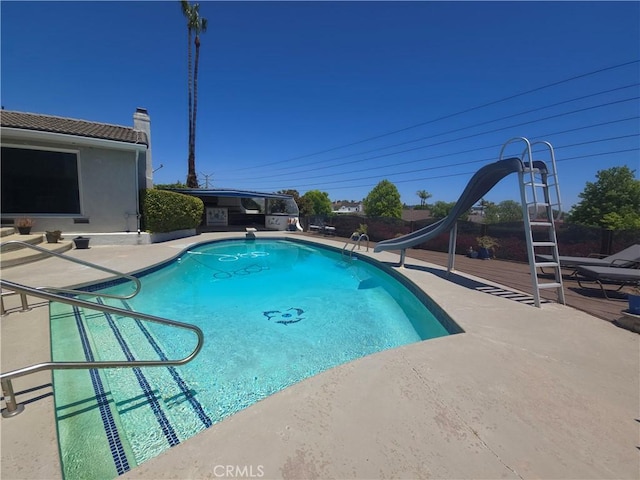5726 Sunmist Dr, Rancho Palos Verdes, CA 90275 - view of swimming pool featuring a water slide and a patio area