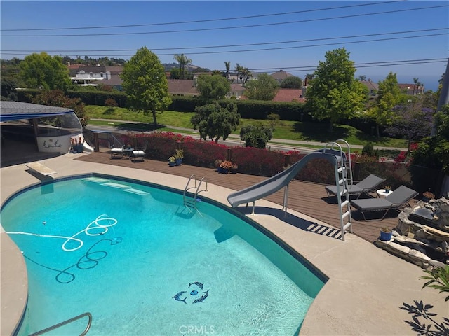 5726 Sunmist Dr, Rancho Palos Verdes, CA 90275 - outdoor pool featuring a water slide and a deck