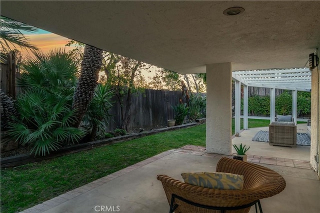 view of patio with fence and a pergola