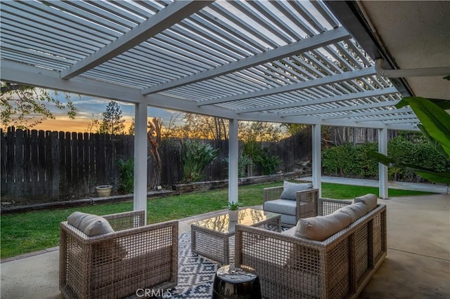 view of patio / terrace featuring a fenced backyard, an outdoor living space, and a pergola