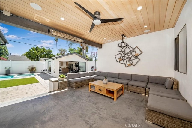 living area featuring a ceiling fan, recessed lighting, wood ceiling, and concrete floors