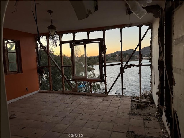 view of patio / terrace with a water view