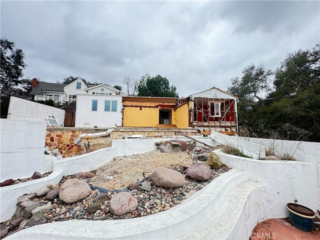 view of front of property with fence