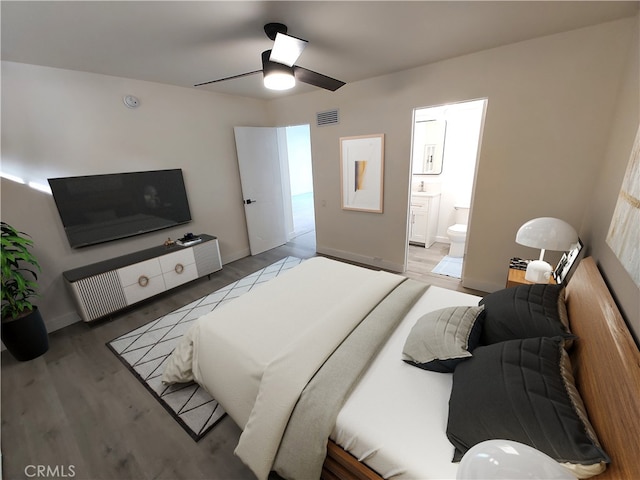 bedroom with visible vents, a ceiling fan, connected bathroom, wood finished floors, and baseboards