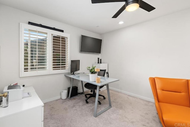 office featuring baseboards, ceiling fan, recessed lighting, and light colored carpet