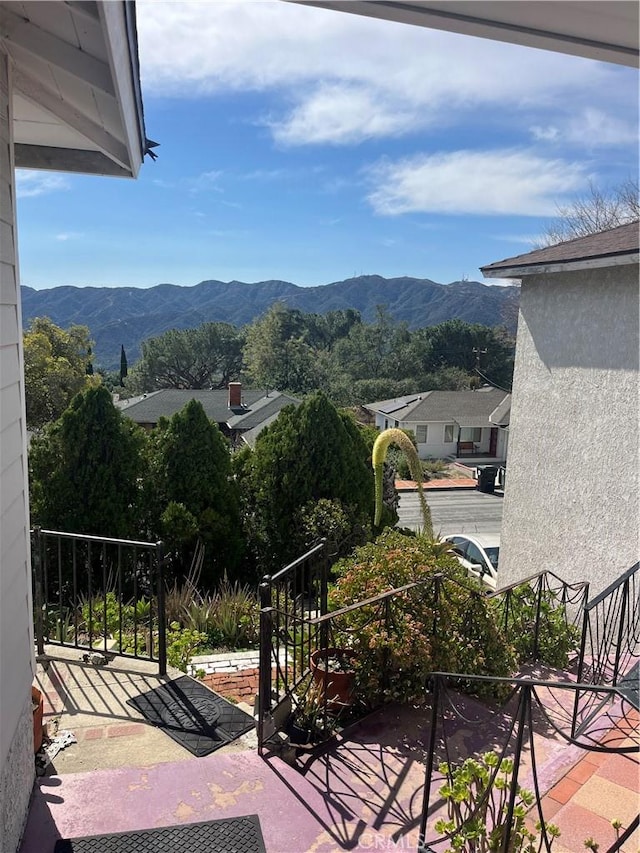 view of patio / terrace with a mountain view