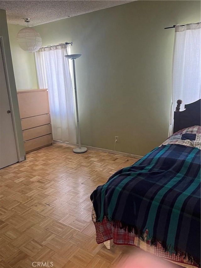 bedroom with a textured ceiling