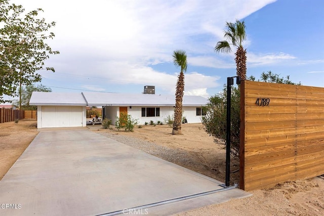 view of front of home with fence