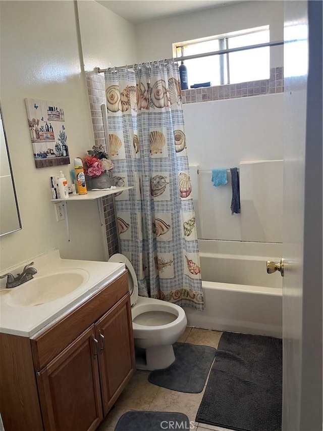 201 W Raymond St, Compton, CA 90220 - bathroom with shower / tub combo with curtain, vanity, and tile patterned flooring