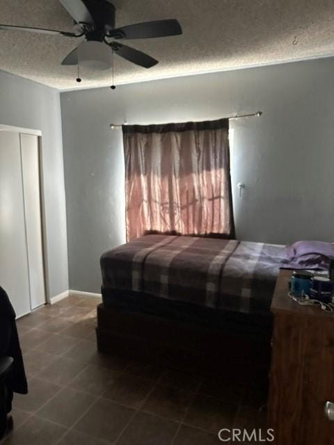201 W Raymond St, Compton, CA 90220 - bedroom with a textured ceiling and a ceiling fan