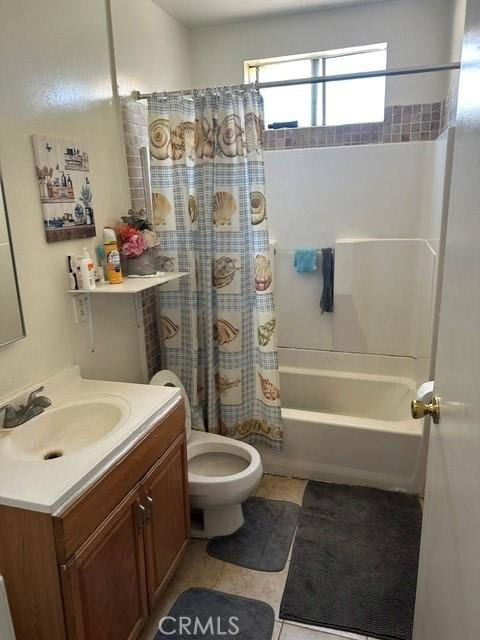 201 W Raymond St, Compton, CA 90220 - bathroom featuring vanity, shower / tub combo, and tile patterned flooring