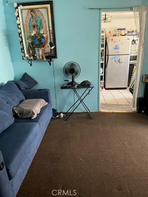 201 W Raymond St, Compton, CA 90220 - living area featuring carpet