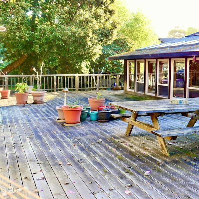 deck featuring a sunroom