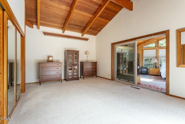 unfurnished bedroom featuring baseboards, carpet, wood ceiling, beamed ceiling, and high vaulted ceiling