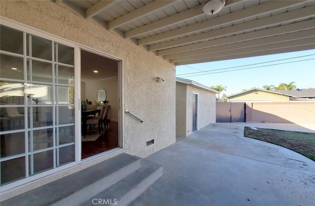 view of patio / terrace with fence and entry steps