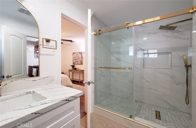 full bathroom with visible vents, ensuite bath, vanity, and a marble finish shower