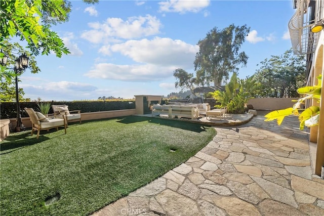 view of yard featuring a fenced backyard and a patio